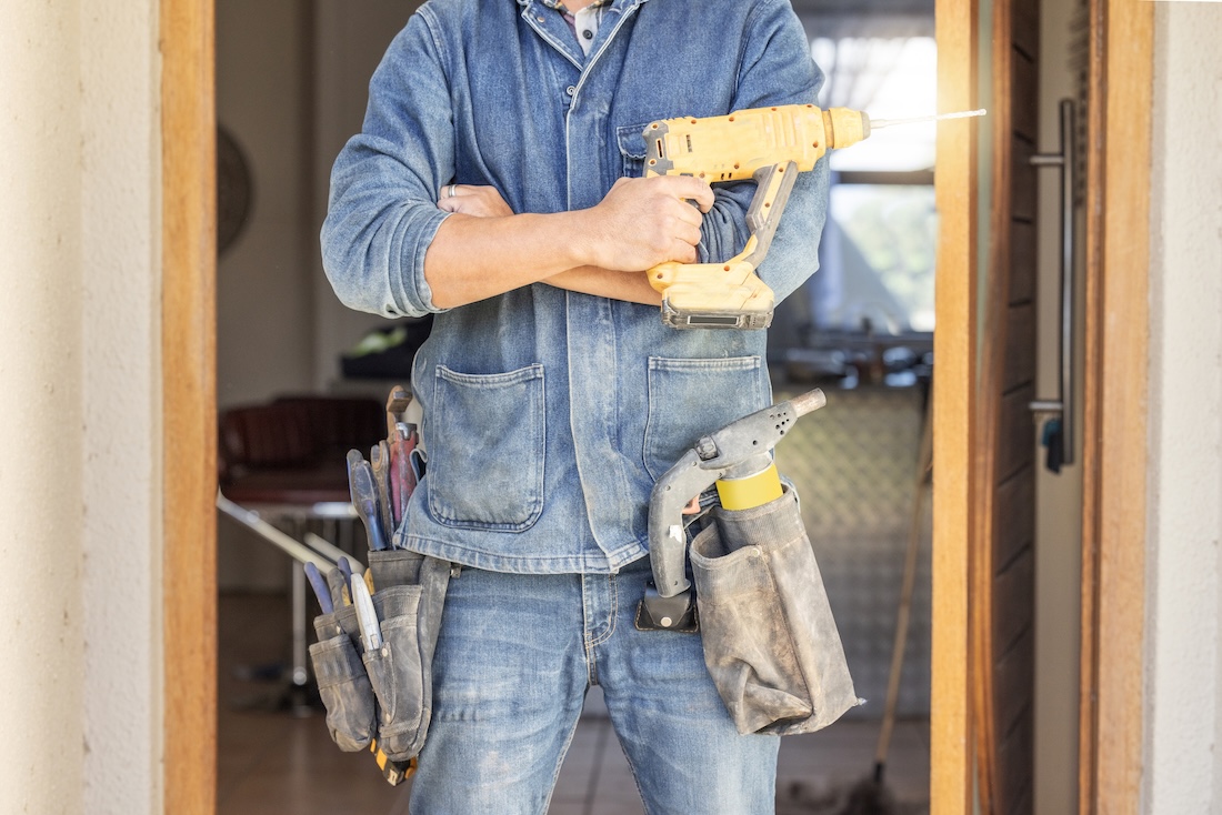 Pine Belt Repair Co. handyman working on a home repair